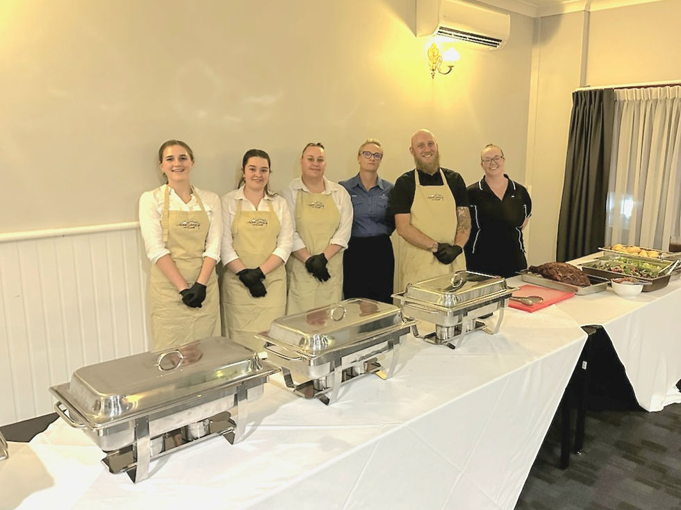 Archers Catering and Events team ready to serve food at an event
